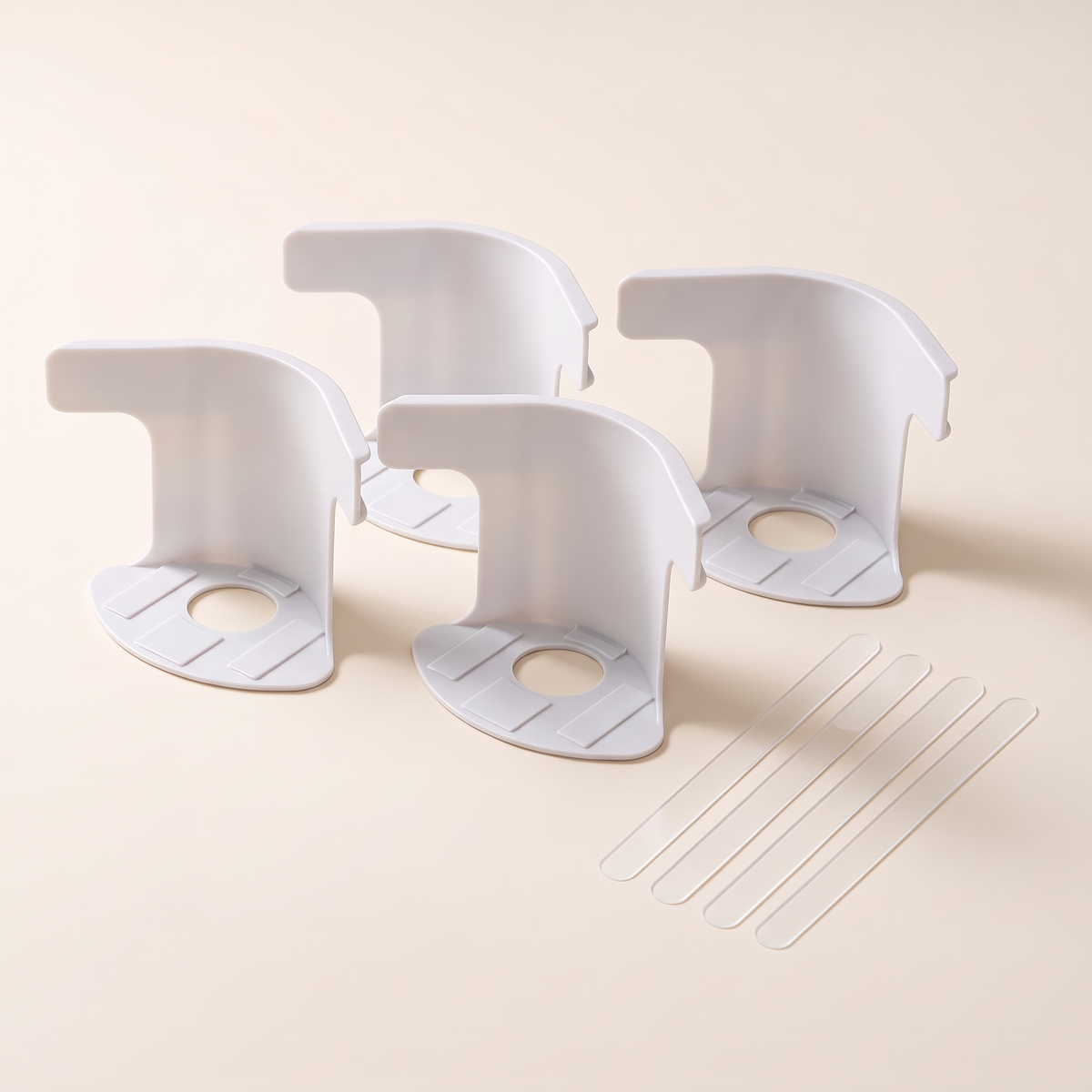 One complete set of four bed sheet corner fasteners and four translucent fixing strips