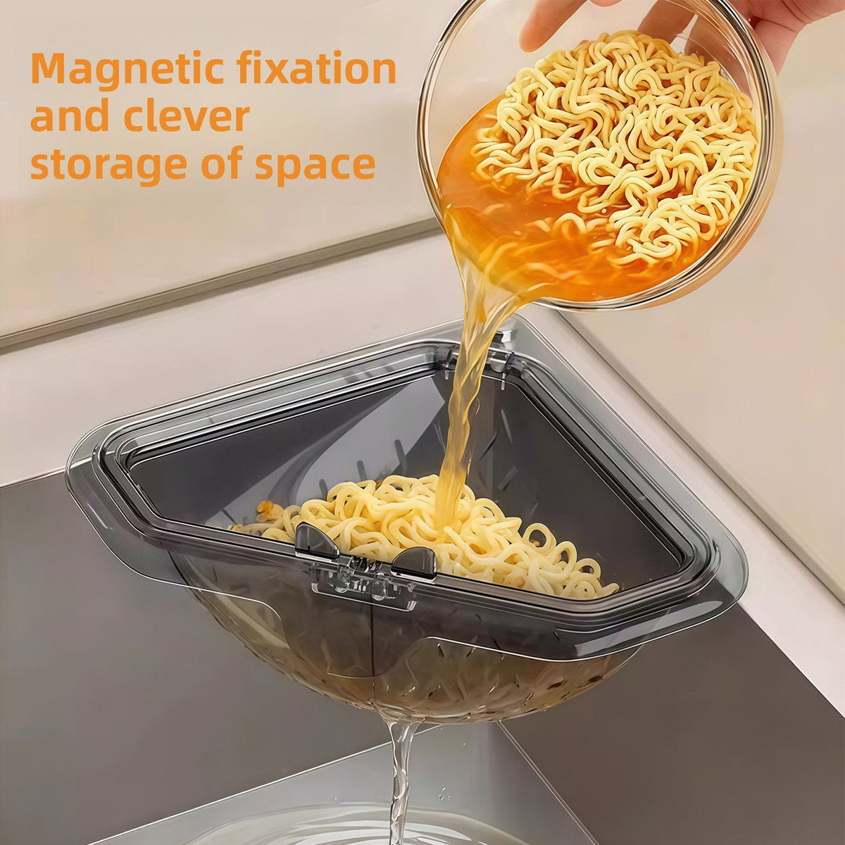 Translucent gray sink strainer basket catching noodles