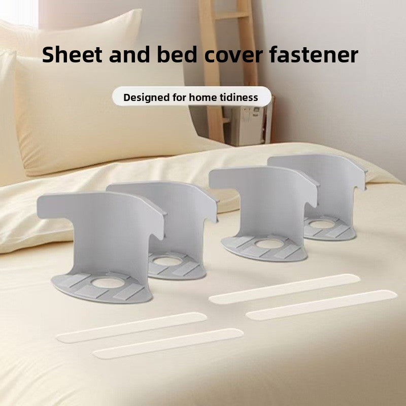 Four no-pin bed sheet fixing clips arranged on a made bed